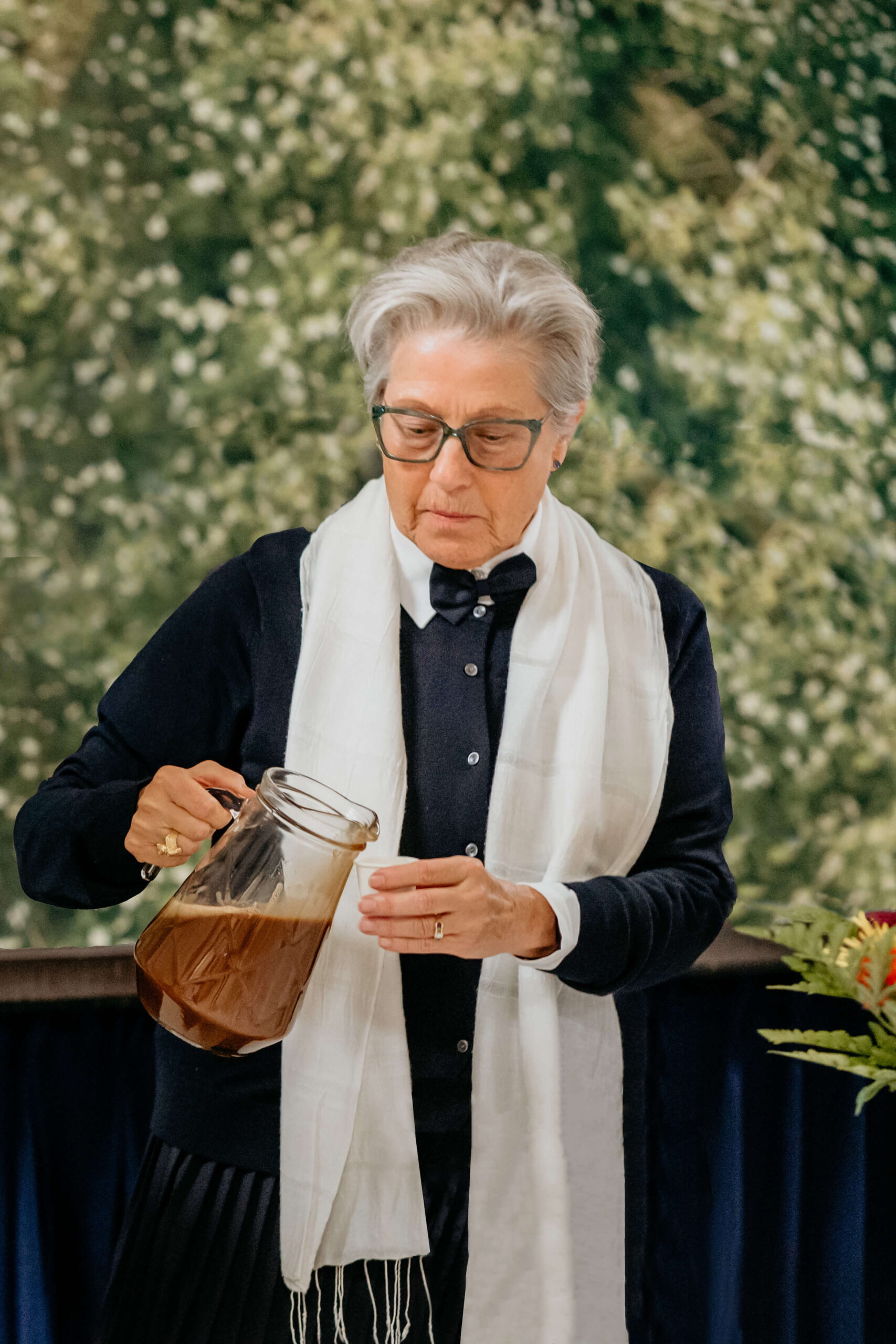 Rev. Dr. Jessica Rochester serving the Daime during a Santo Daime ceremony